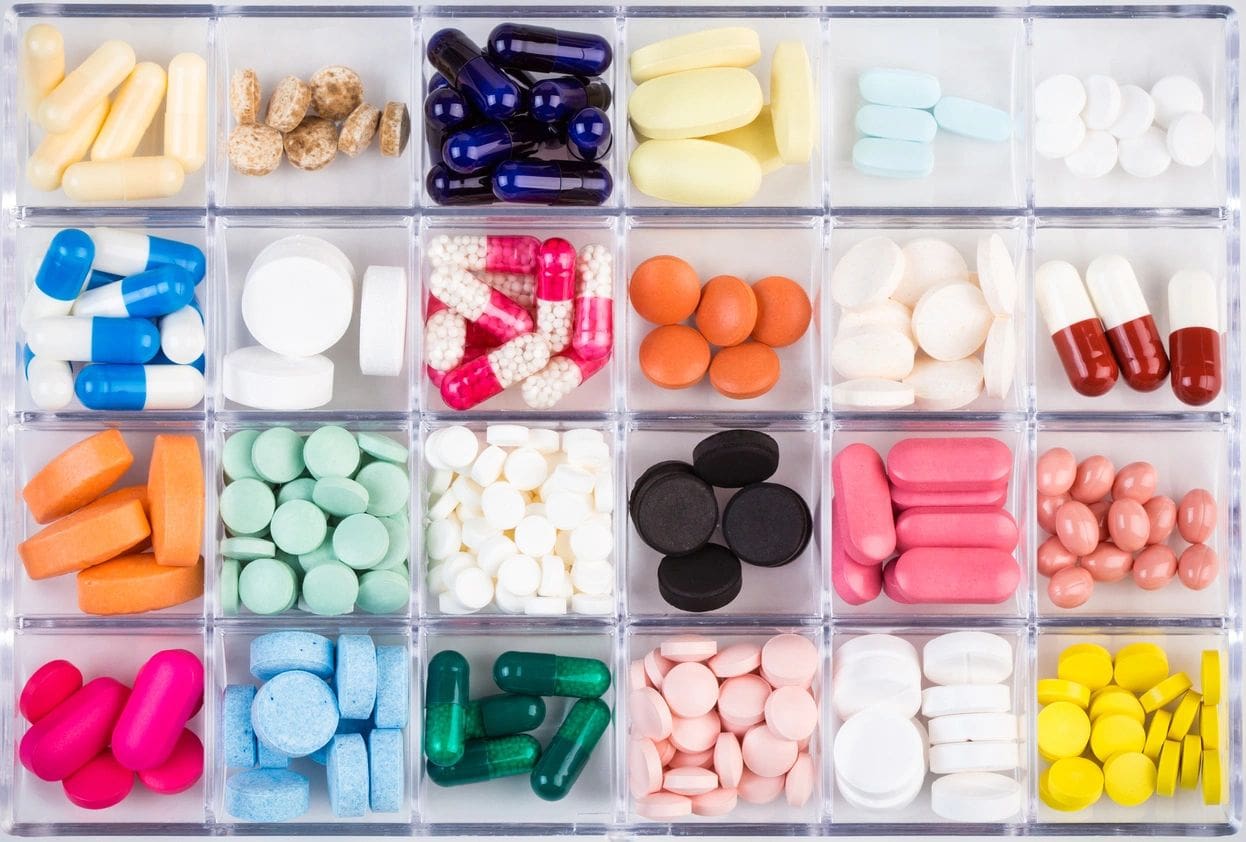 A close up of many different types of pills